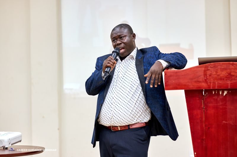 A speaker addressing students at the seminar